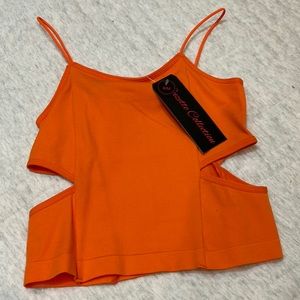 Orange top never worn in the size s/m!!